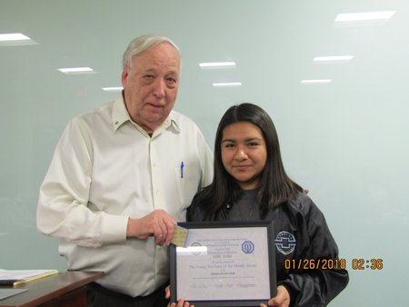 Liaison Ron Traver with Gisel Lora
